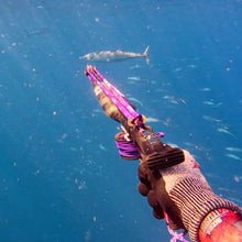 Load image into Gallery viewer, wetmammal speargun line up on wahoo swimming in background