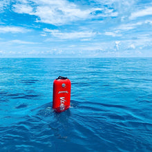 Load image into Gallery viewer, aimrite bluewater float red, floating in ocean