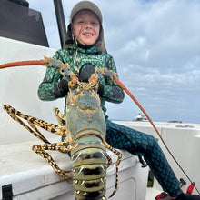 Load image into Gallery viewer, Kid holding large green crayfish close up