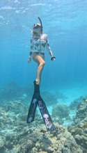Load image into Gallery viewer, Freediving and spearfishing fins, (pruple jellyfish) in water