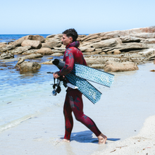 Load image into Gallery viewer, red/purple 5mm wetsuit for spearfishing, lifestyle image