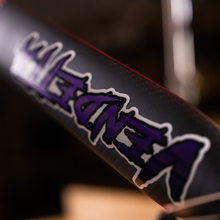 Load image into Gallery viewer, Close up view of Aimrite Purple Vndetta sticker on aimrite vendetta barrel