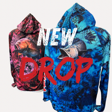 Load image into Gallery viewer, Two sun shirts with fish designs (back)
