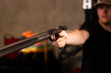 Load image into Gallery viewer, person holding vendetta speargun close up with blurred background
