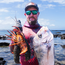 Load image into Gallery viewer, Diver wearing amrite black trucker hat, holding crays and fish

