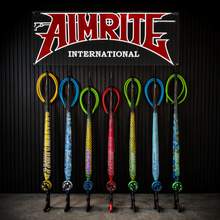 Load image into Gallery viewer, Full view of colour customised Aimrite spearguns with aimrite logo above
